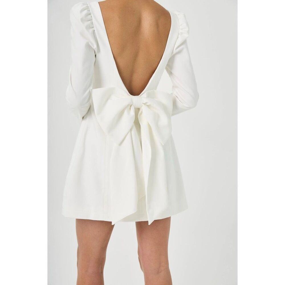 Elegant White Mini Dress with Bow